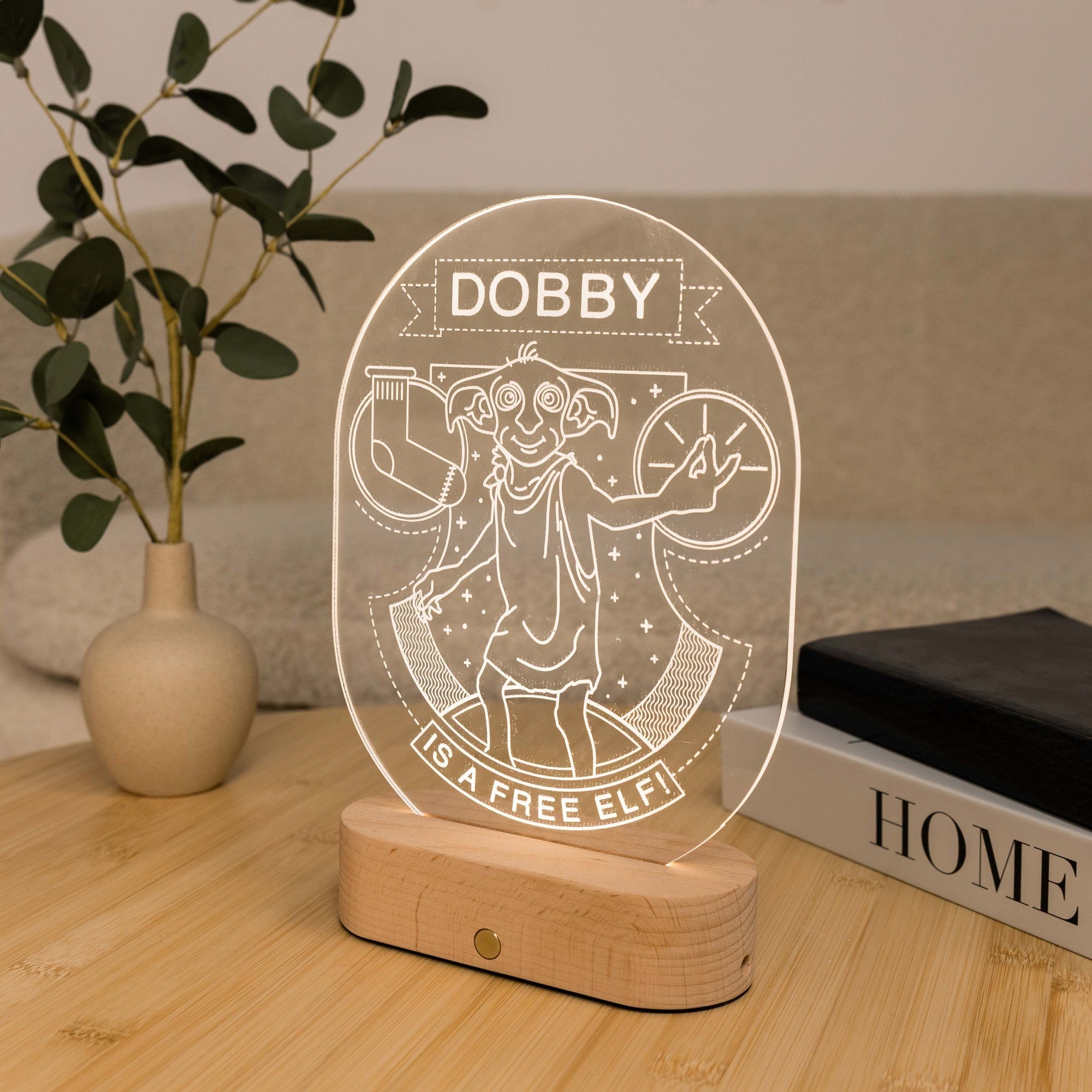 Dobby elf engraved acrylic decorative light on wooden base with eucalyptus plant and books