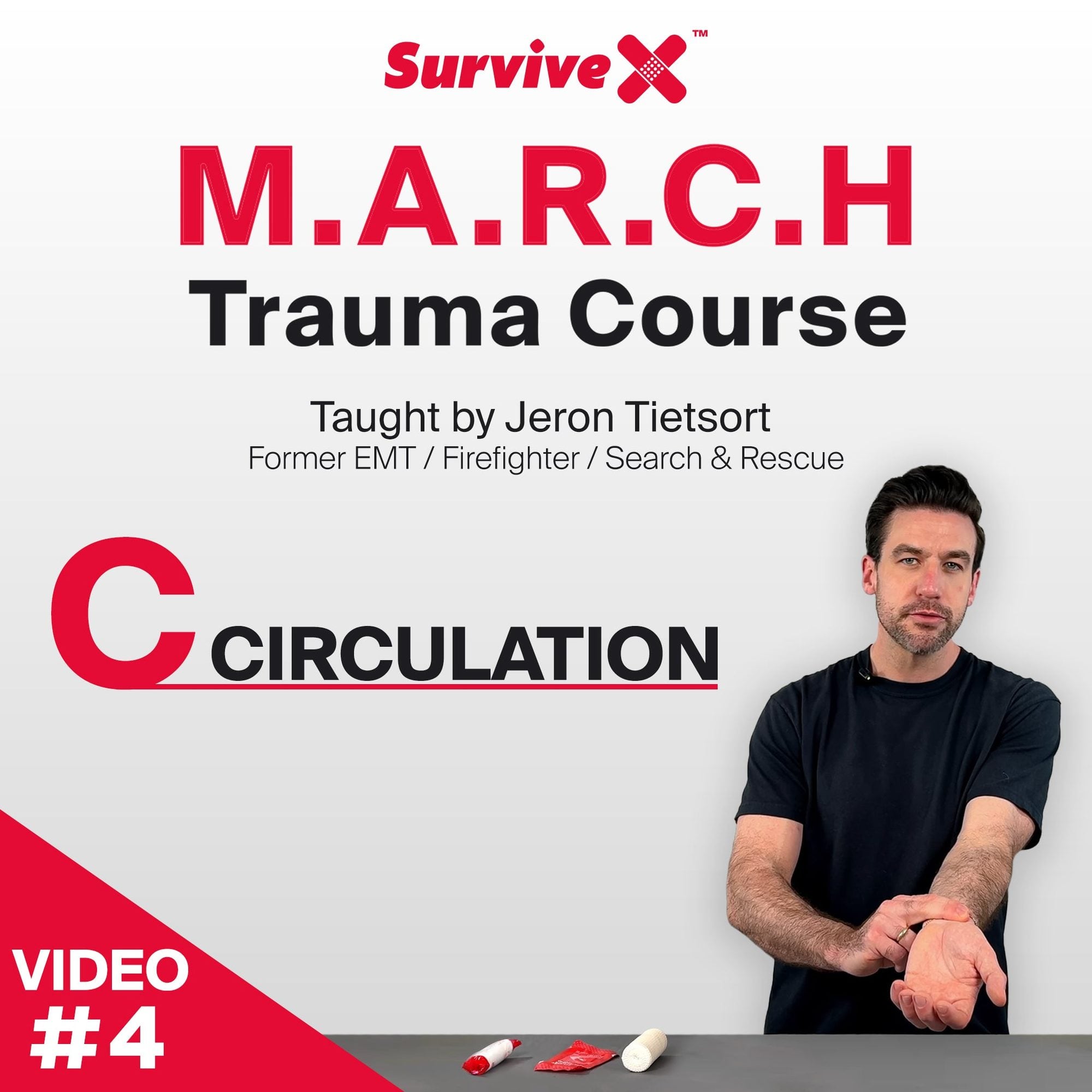 Instructor showing circulation check with first aid supplies on table