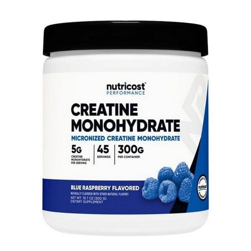 White container of creatine monohydrate powder in blue raspberry flavor with black lid
