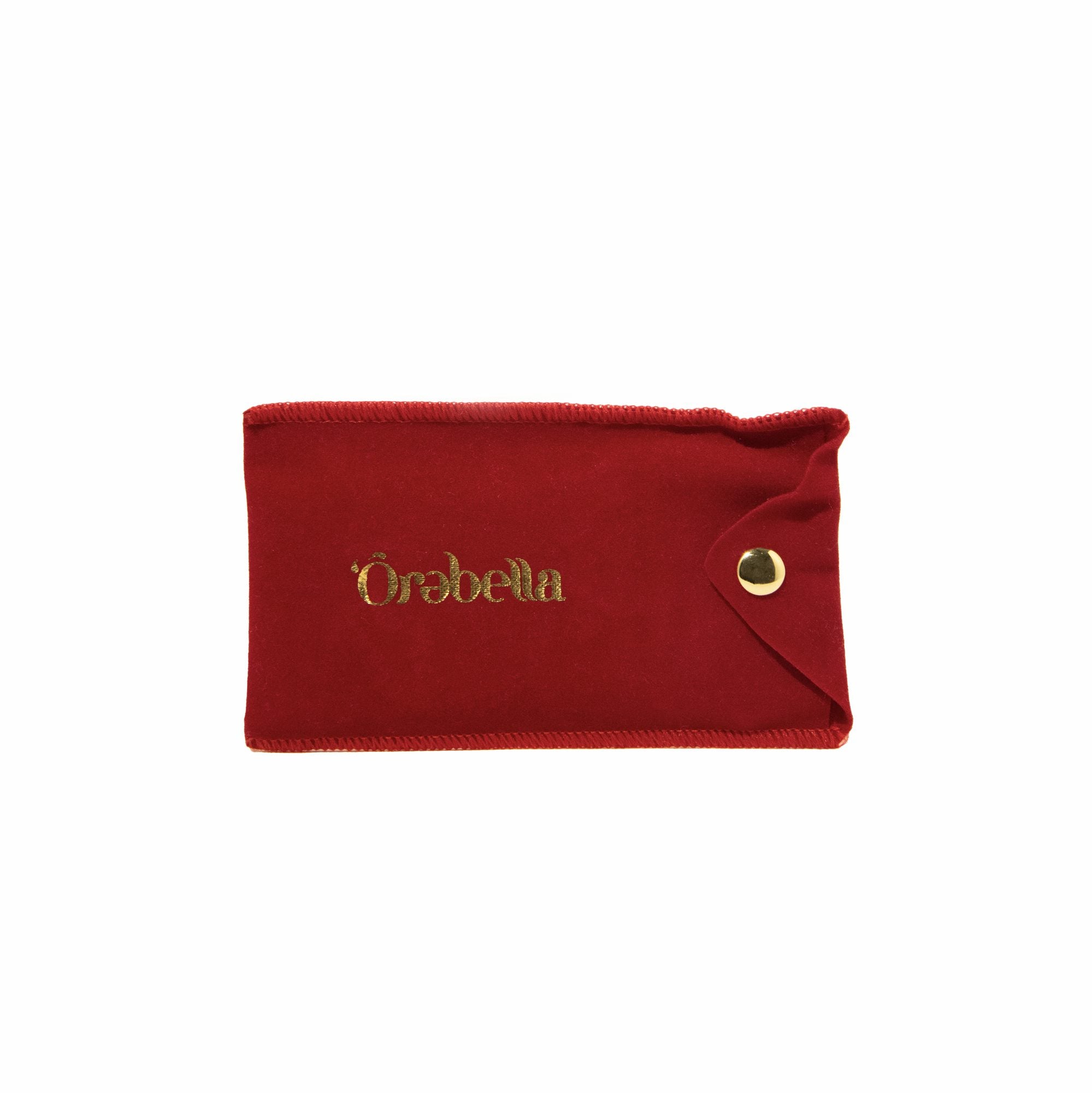 Red velvet pouch with gold snap closure and embroidered text