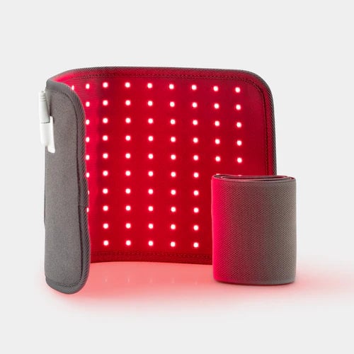 Red light therapy pad device with white polka dot pattern and gray carrying case
