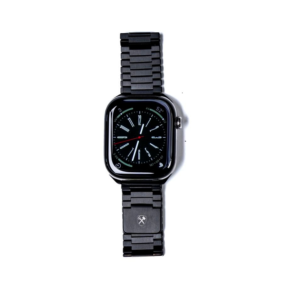 Square black watch with black metal band and minimalist dial displayed on white background